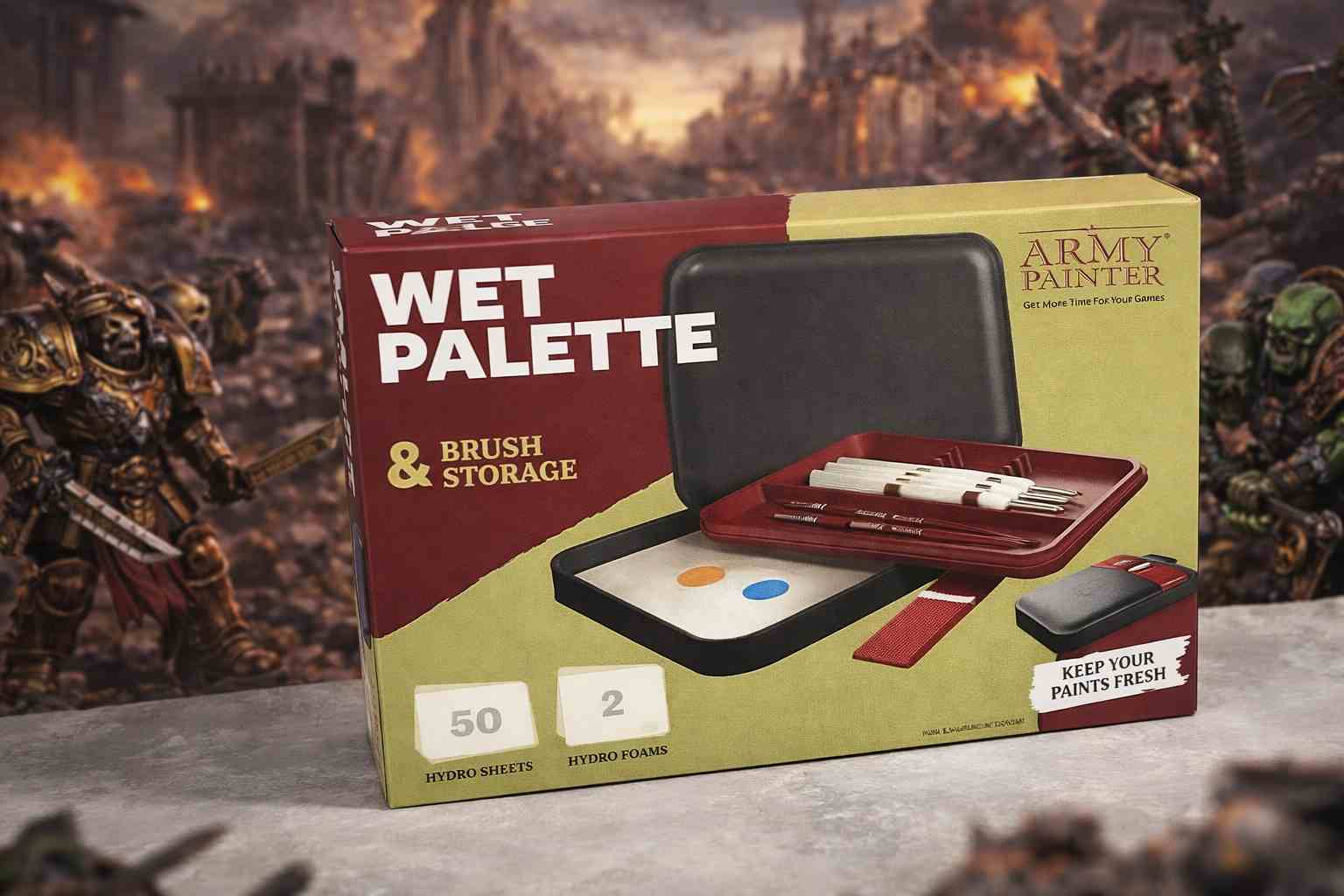 Army Painter Wet Palette on a miniature painting desk with brushes paints and finished miniatures